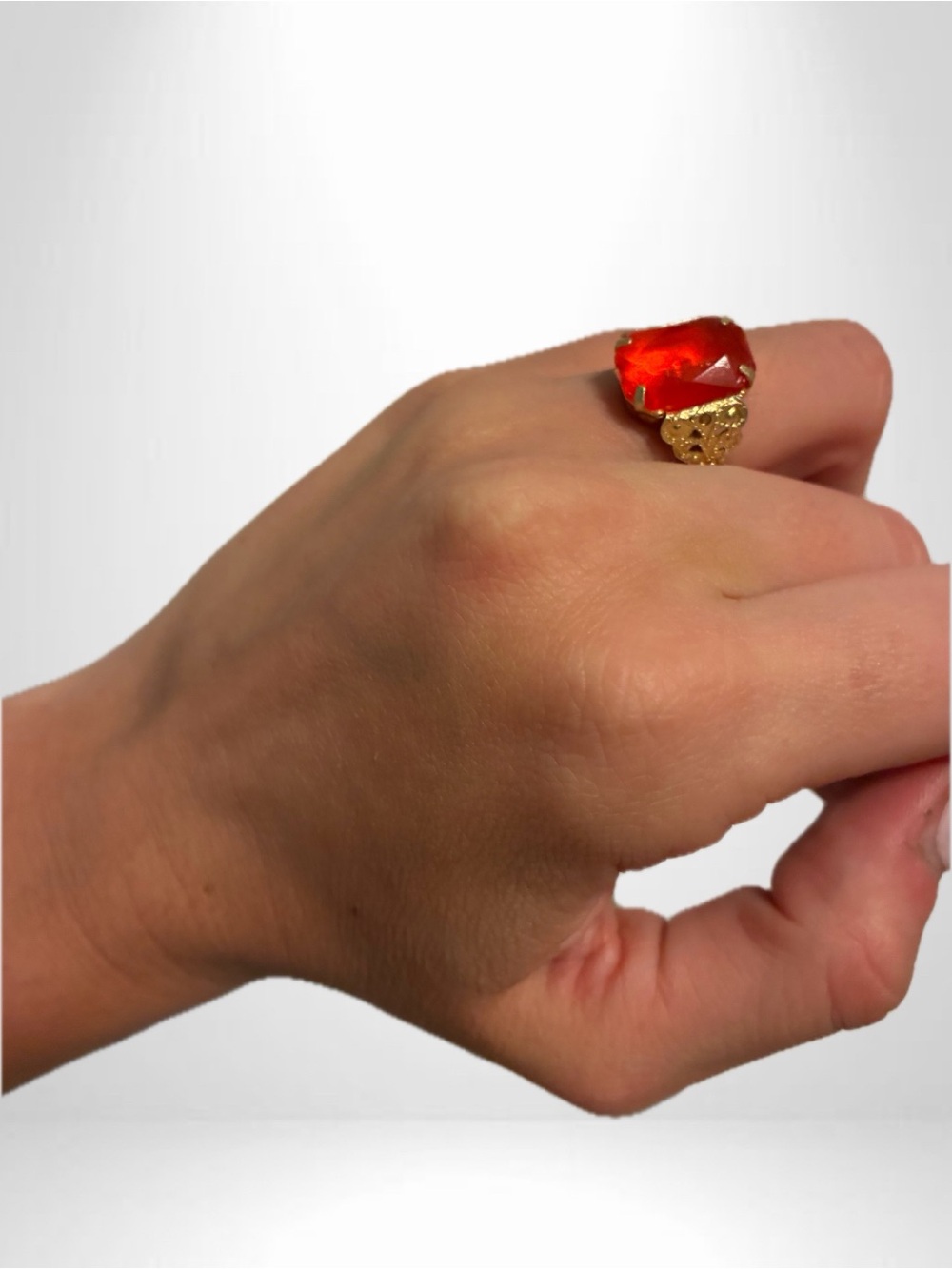 Elegant Gold Ring with Red Gemstone